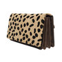 Dark brown leather ladies wallet with a cheetah print
